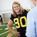 Michigan junior Jake Ryan smiles as he speaks with reporters during media day at the Al Glick Field House on Sunday afternoon. Melanie Maxwell I AnnArbor.com